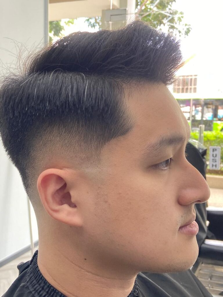 Quiff mid fade by Awi