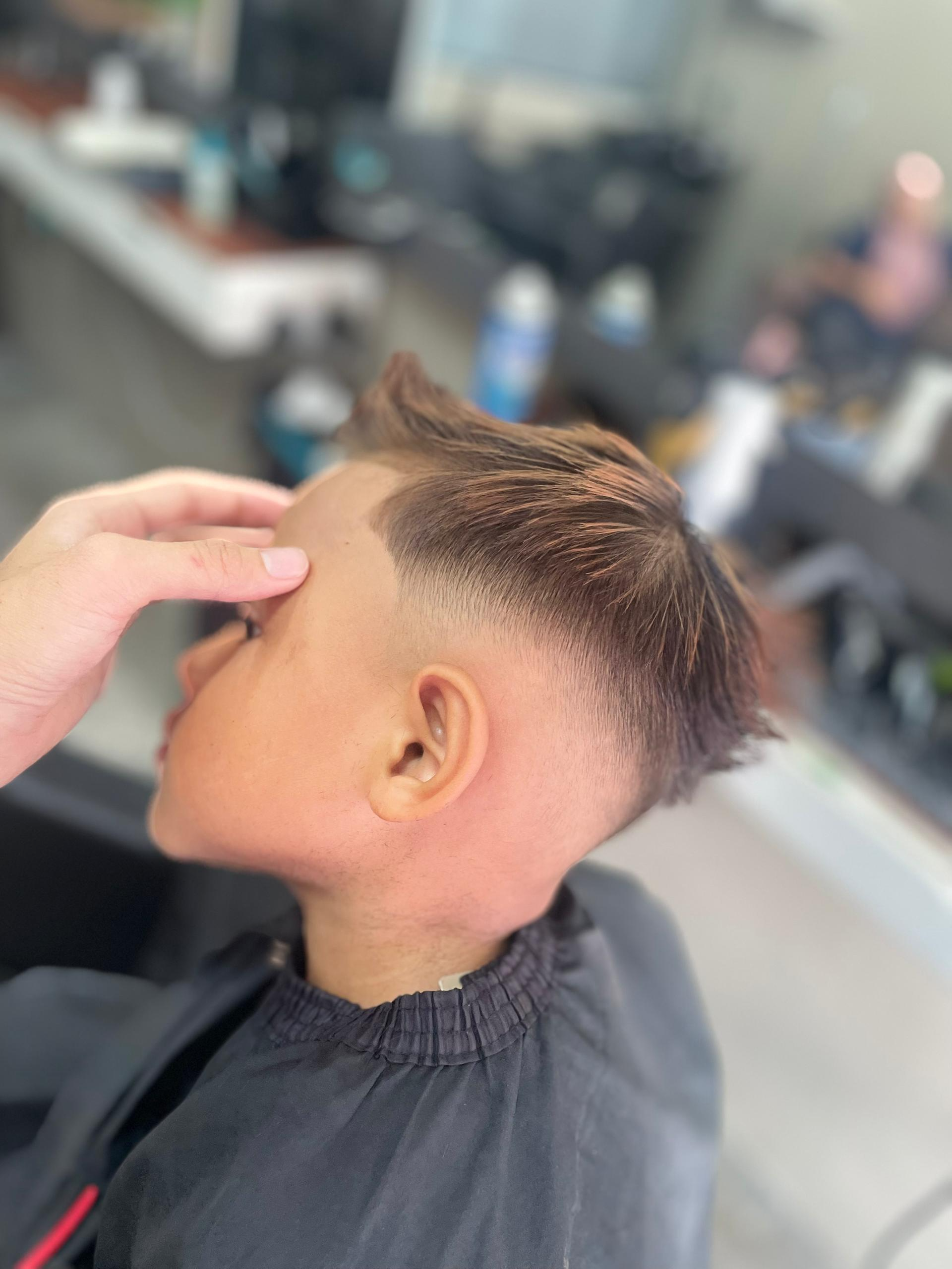 Kids skin fade by Navin